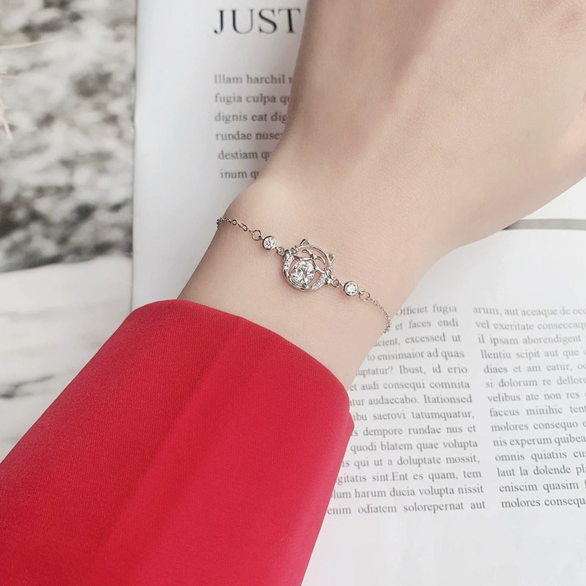 Cat Round Moissanite Adjustable Bracelet with CZ in White Gold-Plated S925 Sterling Silver worn on the wrist showing bracelet scale, fit, and styling