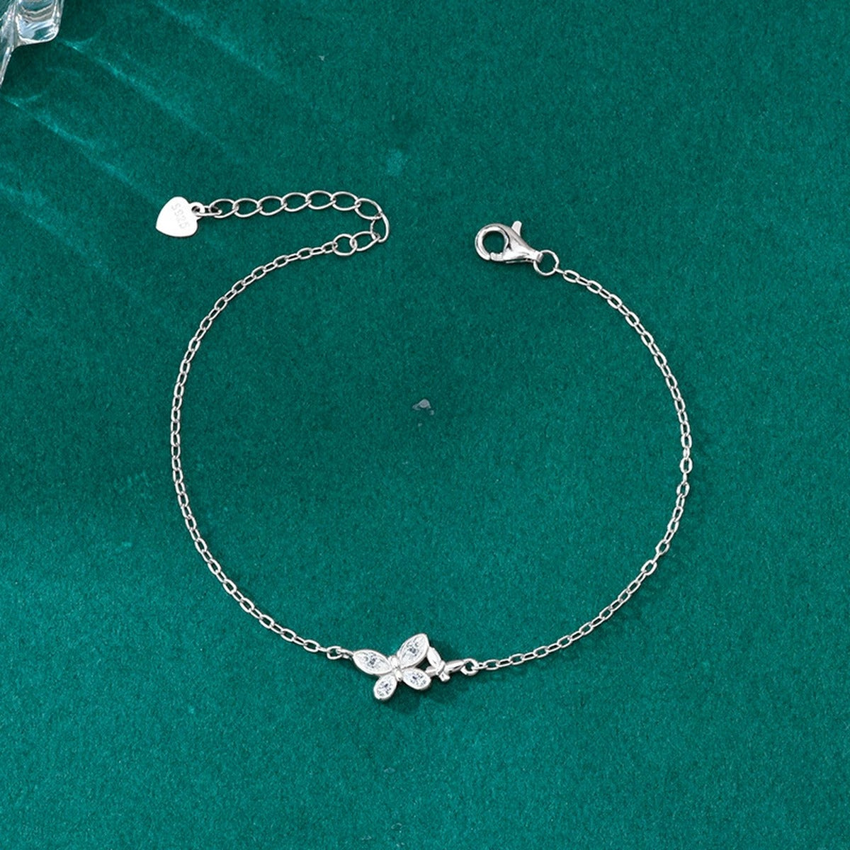 Butterfly Mixed-Cut Moissanite Charm Bracelet in Gold-Plated S925 sterling silver angled product display showing bracelet silhouette