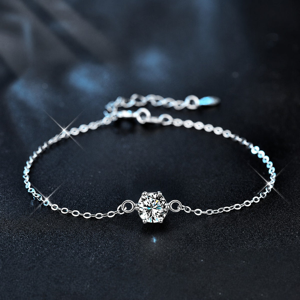 Four or Six-Prong Round Moissanite Solitaire Adjustable Bracelet in White Gold-Plated S925 Sterling Silver product detail view showing the moissanite setting, chain, and polished finish