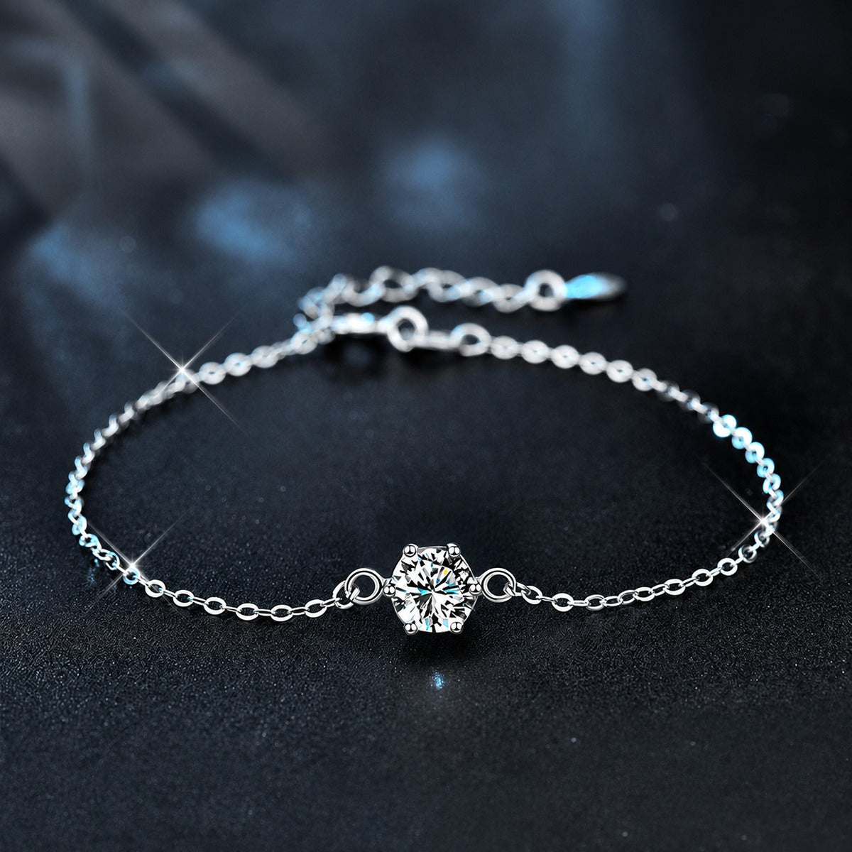 Four or Six-Prong Round Moissanite Solitaire Adjustable Bracelet in White Gold-Plated S925 Sterling Silver product detail view showing the moissanite setting, chain, and polished finish