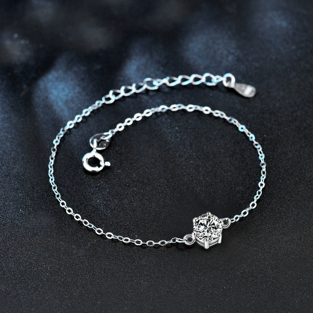 Four or Six-Prong Round Moissanite Solitaire Adjustable Bracelet in White Gold-Plated S925 Sterling Silver product detail view showing the moissanite setting, chain, and polished finish