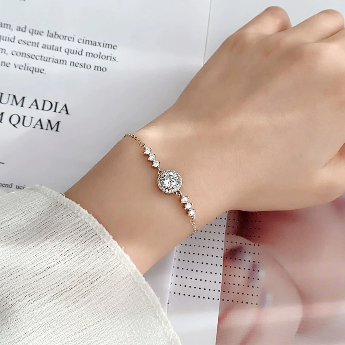 Round Halo Moissanite Adjustable Bracelet in Gold-Plated S925 Sterling Silver worn on the wrist showing bracelet scale, fit, and styling
