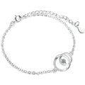 Interlocking Circle Round Moissanite Adjustable Bracelet with CZ in White Gold-Plated S925 Sterling Silver on a white background showing the complete bracelet silhouette, center motif, and setting