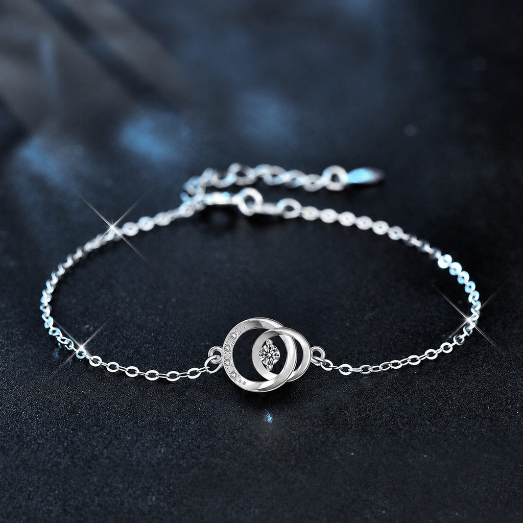 Interlocking Circle Round Moissanite Adjustable Bracelet with CZ in White Gold-Plated S925 Sterling Silver product detail view showing the moissanite setting, chain, and polished finish