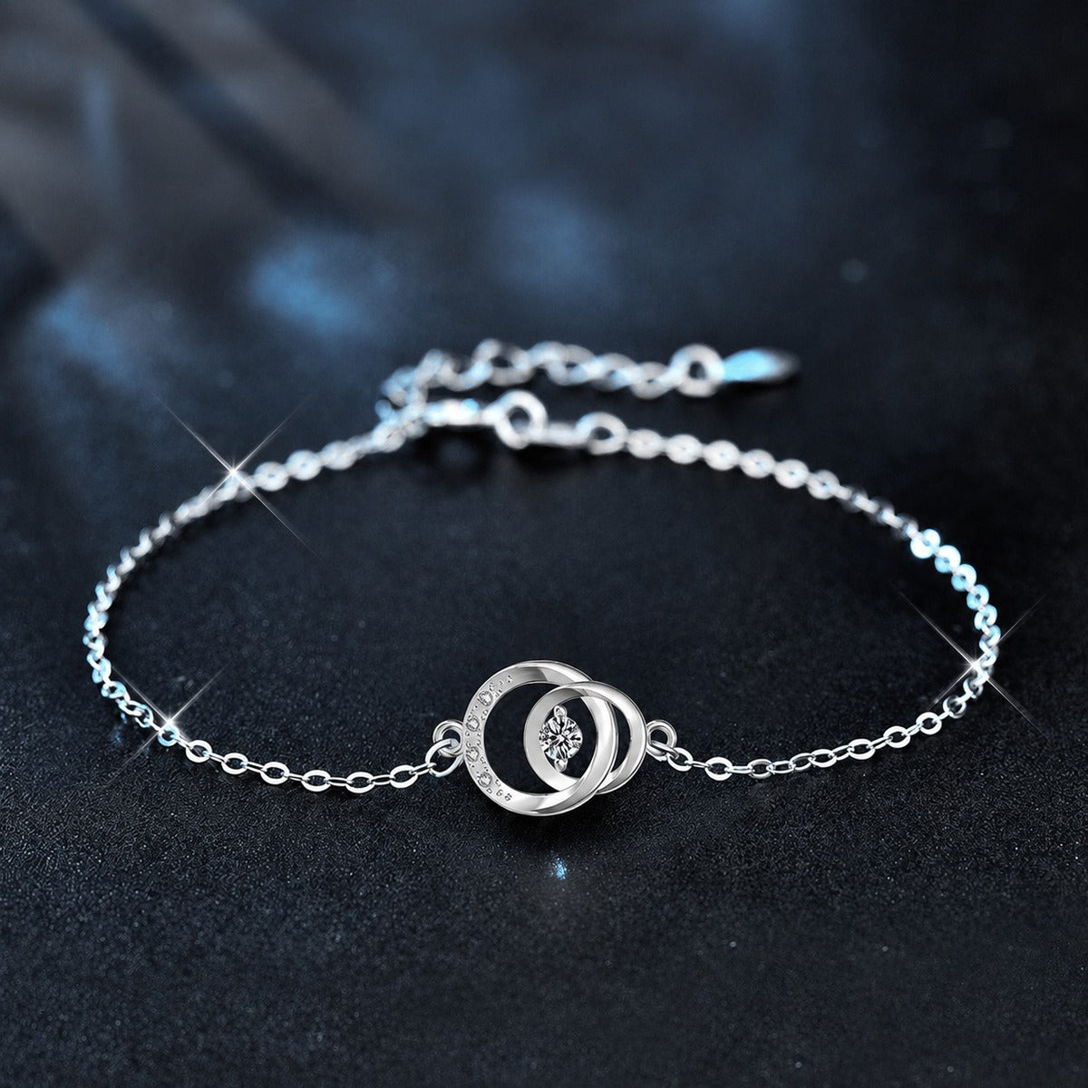 Interlocking Circle Round Moissanite Adjustable Bracelet with CZ in White Gold-Plated S925 Sterling Silver product detail view showing the moissanite setting, chain, and polished finish
