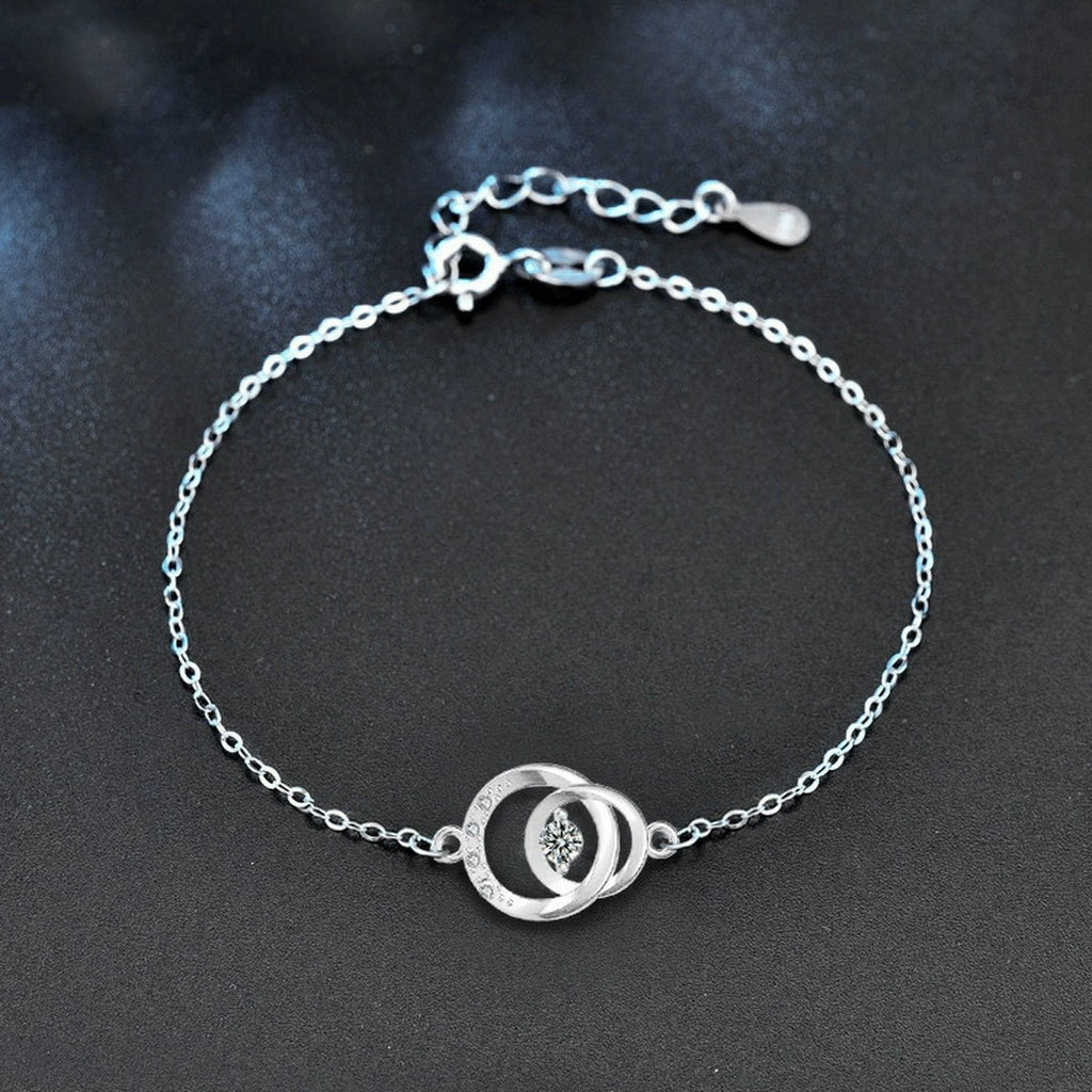 Interlocking Circle Round Moissanite Adjustable Bracelet with CZ in White Gold-Plated S925 Sterling Silver product detail view showing the moissanite setting, chain, and polished finish