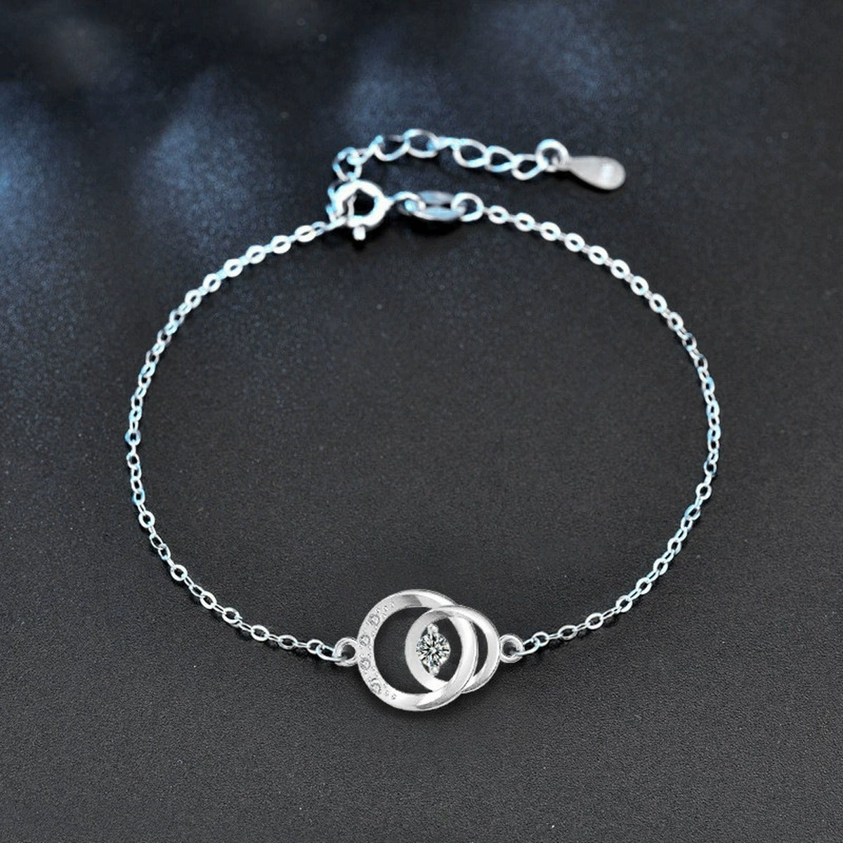 Interlocking Circle Round Moissanite Adjustable Bracelet with CZ in White Gold-Plated S925 Sterling Silver product detail view showing the moissanite setting, chain, and polished finish