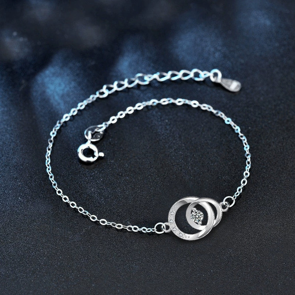 Interlocking Circle Round Moissanite Adjustable Bracelet with CZ in White Gold-Plated S925 Sterling Silver product detail view showing the moissanite setting, chain, and polished finish