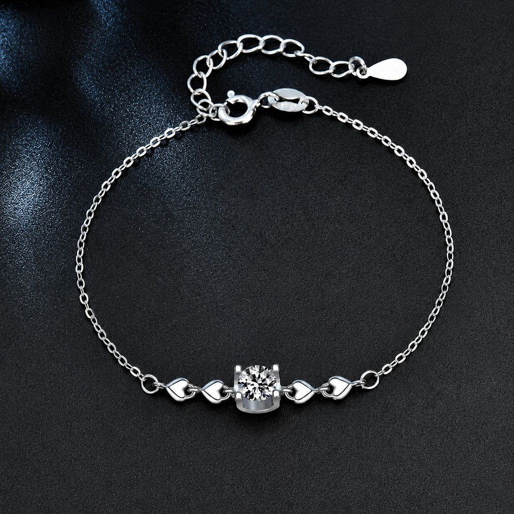 Round Moissanite Solitaire Adjustable Bracelet in White Gold-Plated S925 Sterling Silver product detail view showing the moissanite setting, chain, and polished finish