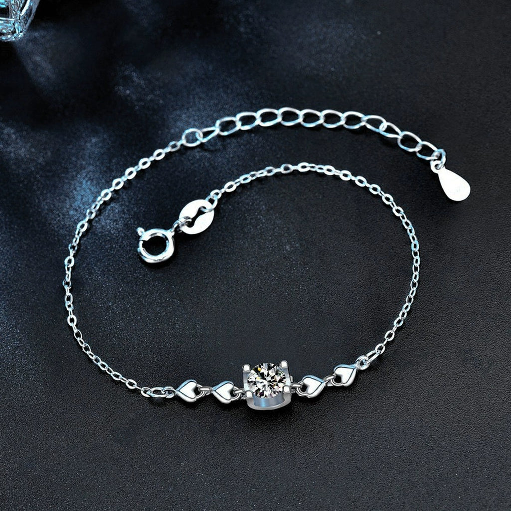 Round Moissanite Solitaire Adjustable Bracelet in White Gold-Plated S925 Sterling Silver product detail view showing the moissanite setting, chain, and polished finish
