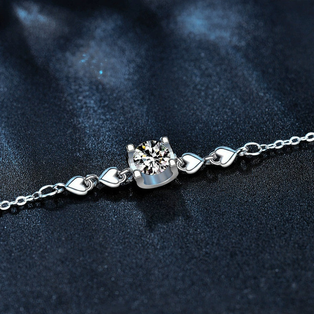 Round Moissanite Solitaire Adjustable Bracelet in White Gold-Plated S925 Sterling Silver product detail view showing the moissanite setting, chain, and polished finish