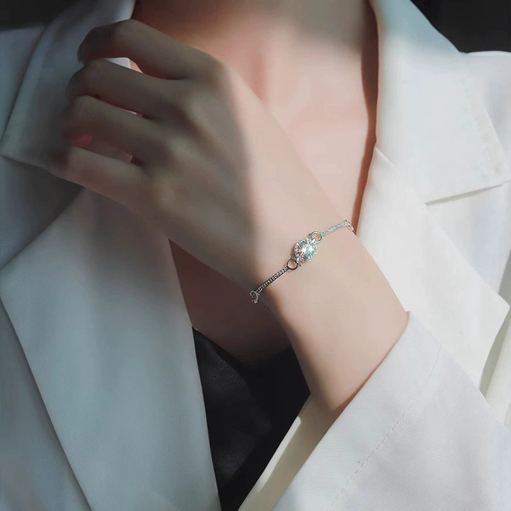 Round Halo Moissanite Bracelet with CZ in White Gold-Plated S925 sterling silver worn on wrist model view showing scale and adjustable fit