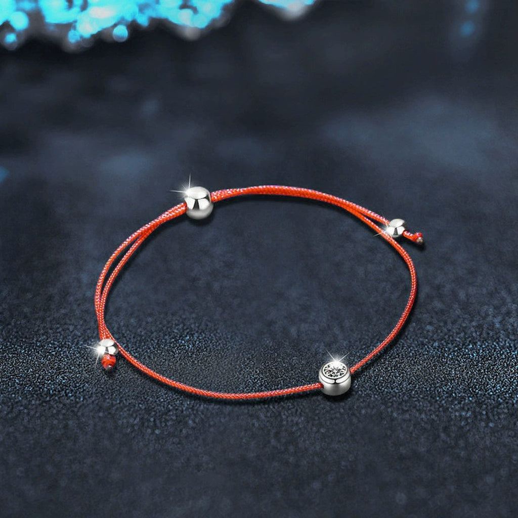 Round Moissanite Beaded Cord Bracelet in White Gold-Plated S925 sterling silver angled product display showing bracelet silhouette