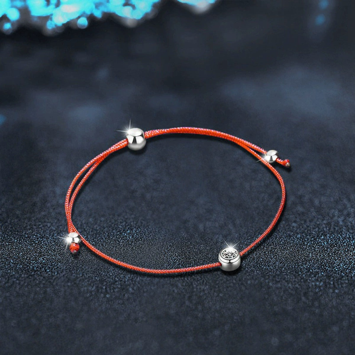Round Moissanite Beaded Cord Bracelet in White Gold-Plated S925 sterling silver angled product display showing bracelet silhouette