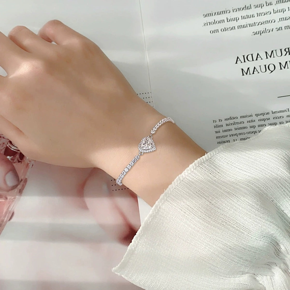 Heart-Cut Moissanite Adjustable Tennis Bracelet in White Gold-Plated S925 Sterling Silver worn on the wrist showing bracelet scale, fit, and styling
