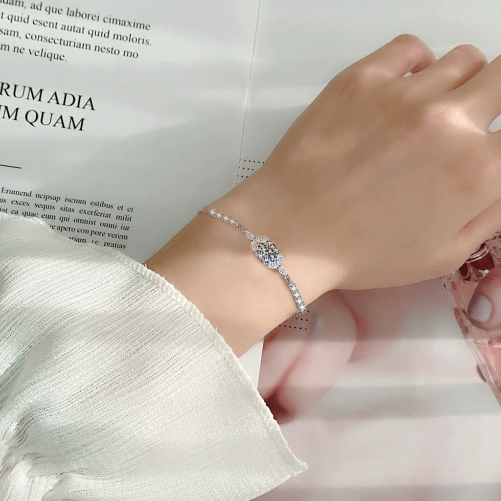 Marquise Halo Round Moissanite Bolo Bracelet with CZ in White Gold-Plated S925 Sterling Silver worn on the wrist showing bracelet scale, fit, and styling