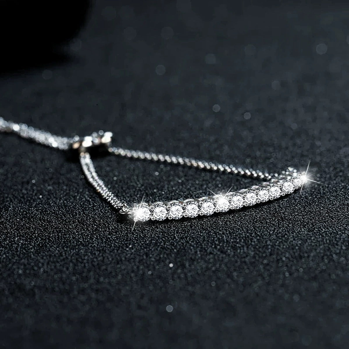 Round Moissanite Bolo Tennis Bracelet in White Gold-Plated S925 sterling silver close-up bracelet detail view showing clasp and motif