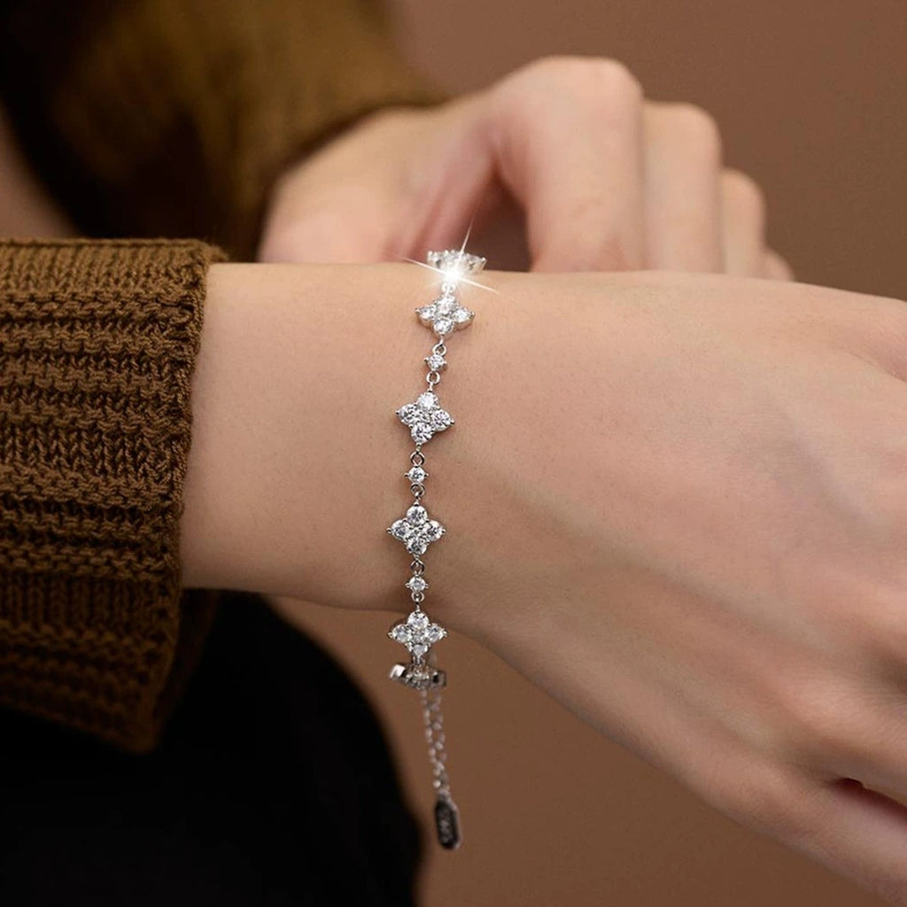 Clover Round Moissanite Charm Bracelet with CZ in Gold-Plated S925 sterling silver worn on wrist model view showing scale and adjustable fit