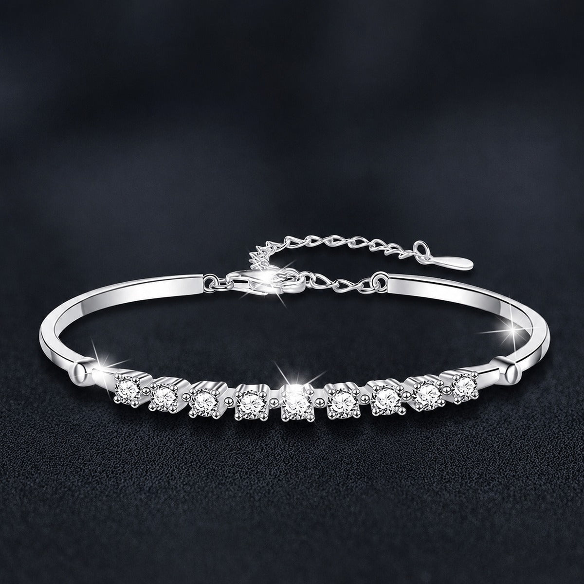 Graduated Round Moissanite Bangle Bracelet in White Gold-Plated S925 sterling silver styled product scene showing stone sparkle and chain detail