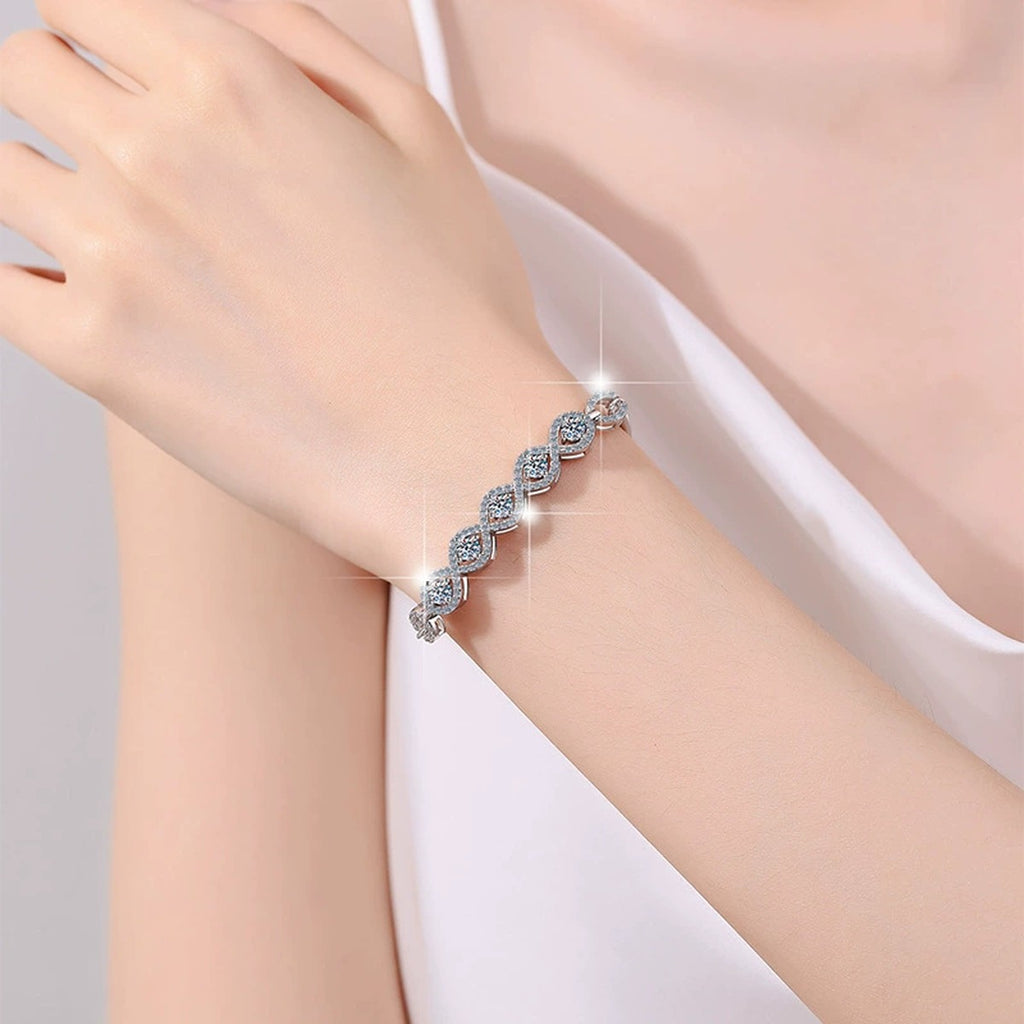 Five-Stone Round Moissanite Bangle Bracelet with CZ in White Gold-Plated S925 sterling silver worn on wrist model view showing scale and adjustable fit