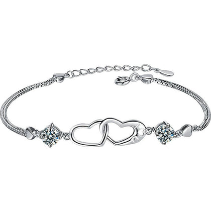 Double Heart Round Moissanite Bracelet in White Gold-Plated S925 sterling silver white background product photo showing bracelet shape and moissanite setting