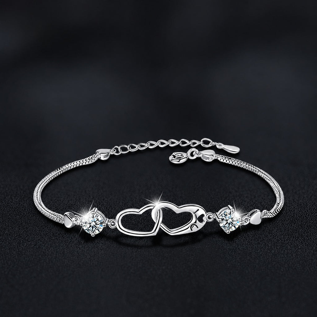 Double Heart Round Moissanite Bracelet in White Gold-Plated S925 sterling silver styled product scene showing stone sparkle and chain detail