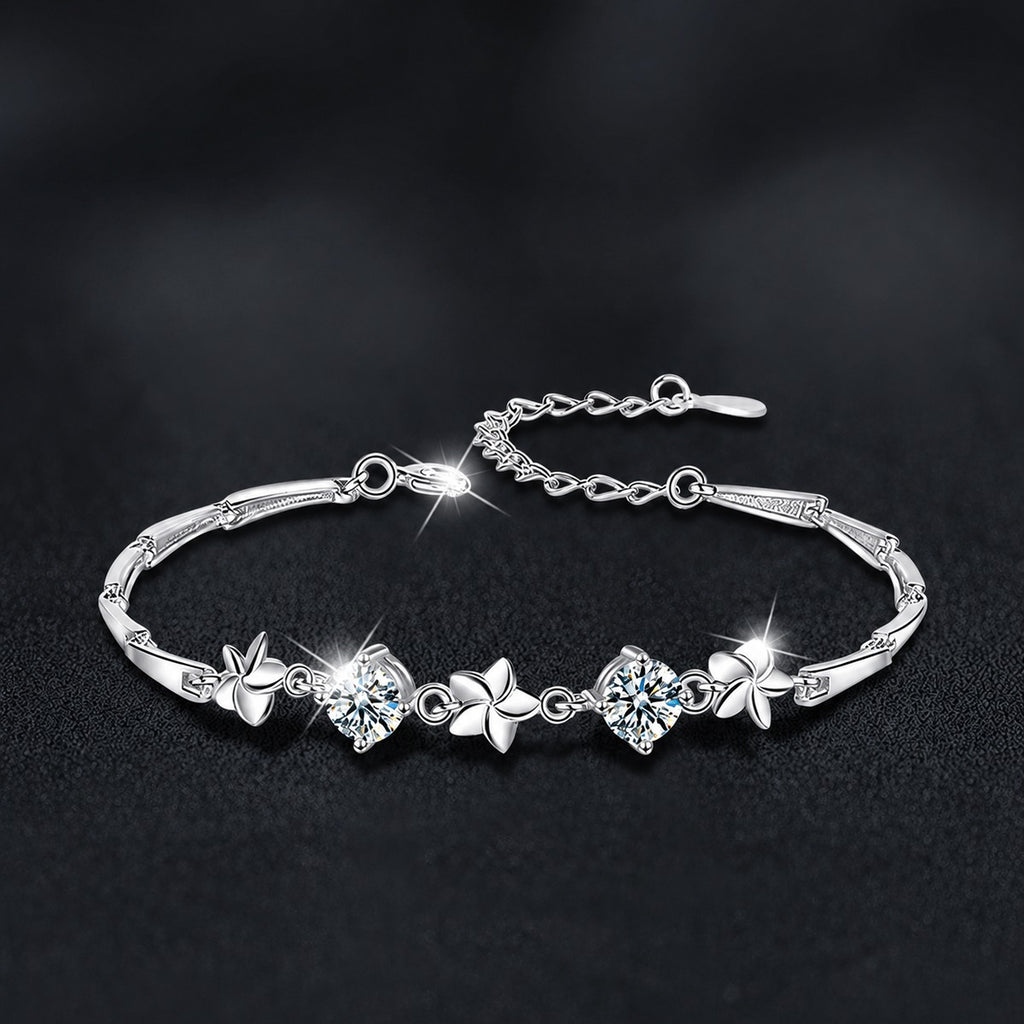 Pinwheel Round Moissanite Bracelet in White Gold-Plated S925 sterling silver styled product scene showing stone sparkle and chain detail