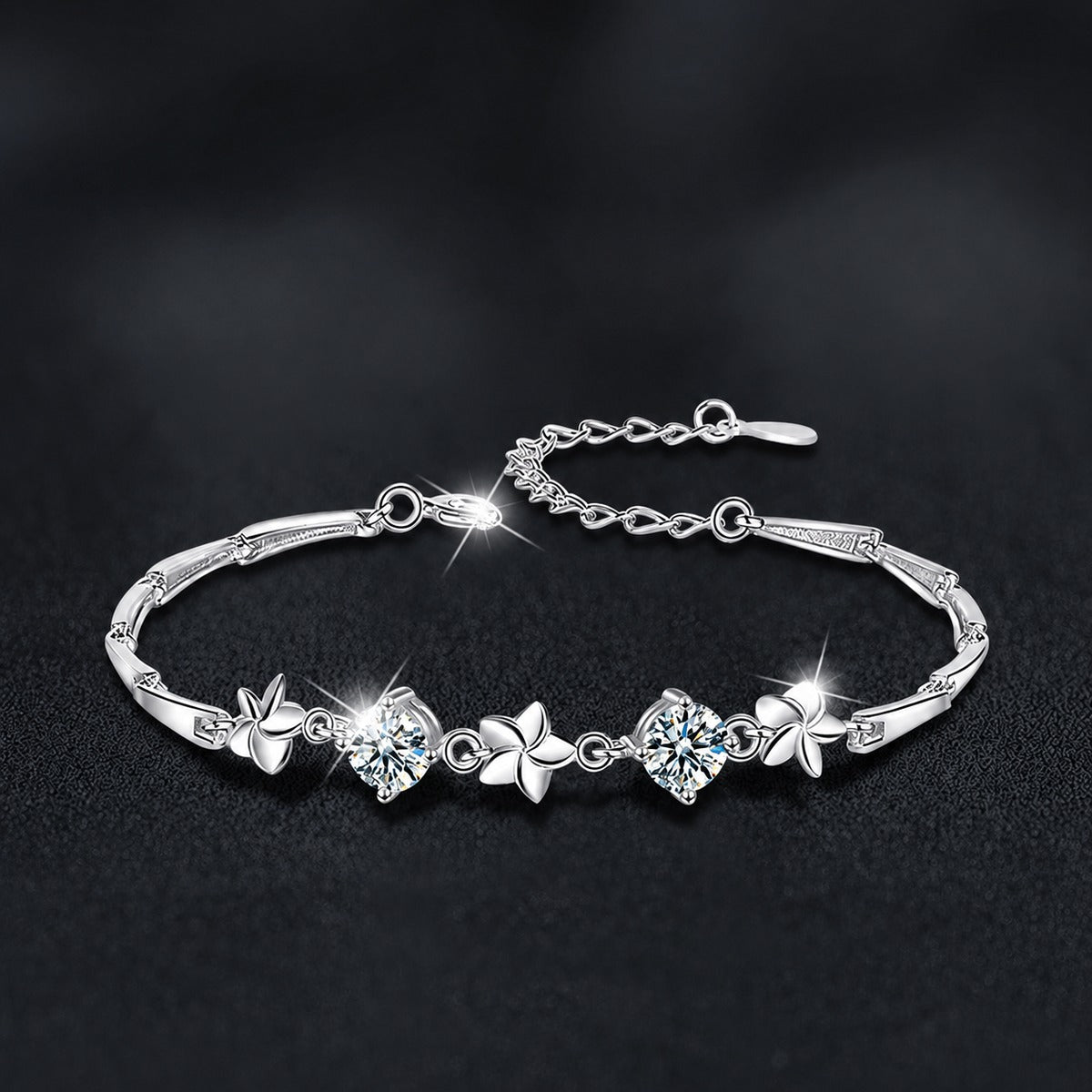 Pinwheel Round Moissanite Bracelet in White Gold-Plated S925 sterling silver styled product scene showing stone sparkle and chain detail