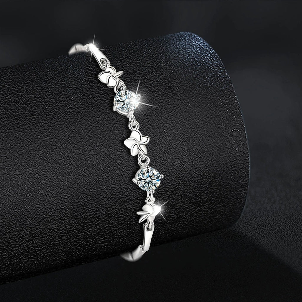 Pinwheel Round Moissanite Bracelet in White Gold-Plated S925 sterling silver close-up bracelet detail view showing clasp and motif