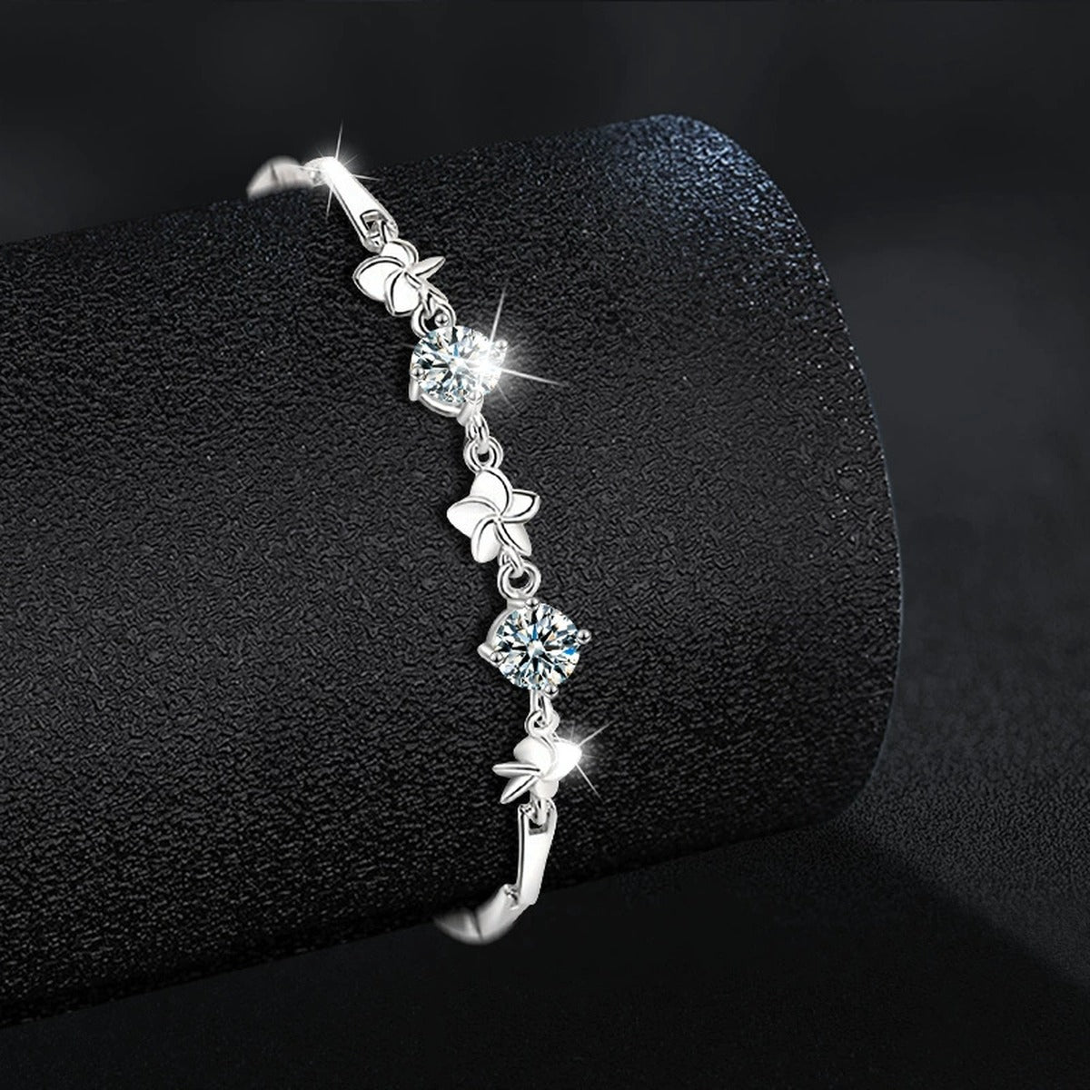 Pinwheel Round Moissanite Bracelet in White Gold-Plated S925 sterling silver close-up bracelet detail view showing clasp and motif