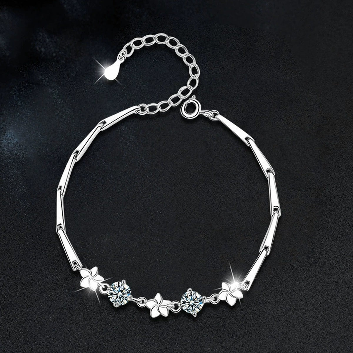 Pinwheel Round Moissanite Bracelet in White Gold-Plated S925 sterling silver angled product display showing bracelet silhouette