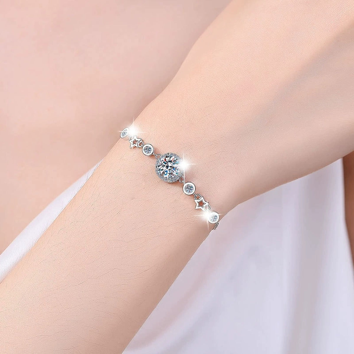 Round Moissanite Charm Bracelet with CZ in White Gold-Plated S925 sterling silver worn on wrist model view showing scale and adjustable fit