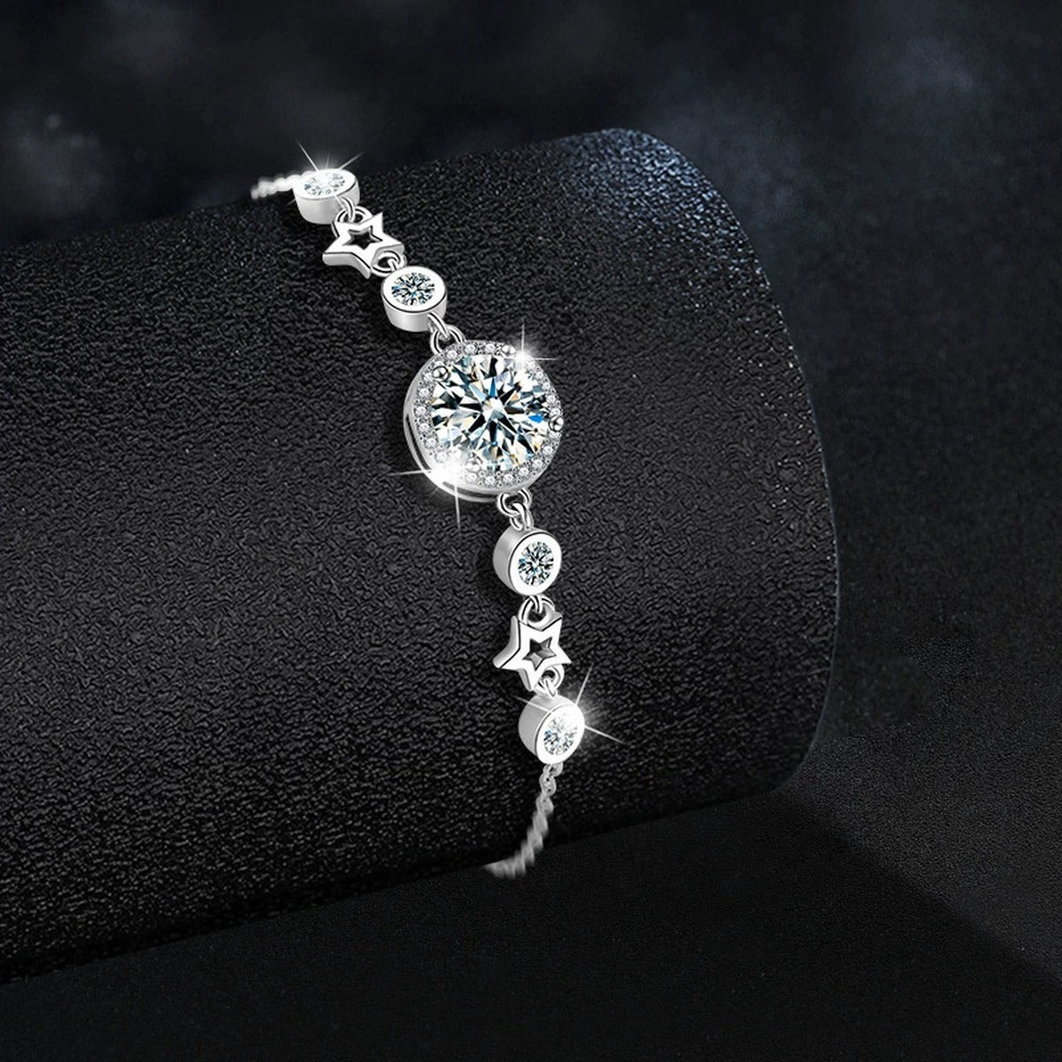 Round Moissanite Charm Bracelet with CZ in White Gold-Plated S925 sterling silver angled product display showing bracelet silhouette