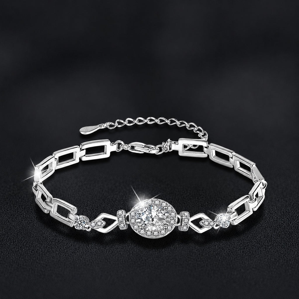 Oval-Cut Moissanite Geometric Bracelet with CZ in White Gold-Plated S925 sterling silver styled product scene showing stone sparkle and chain detail