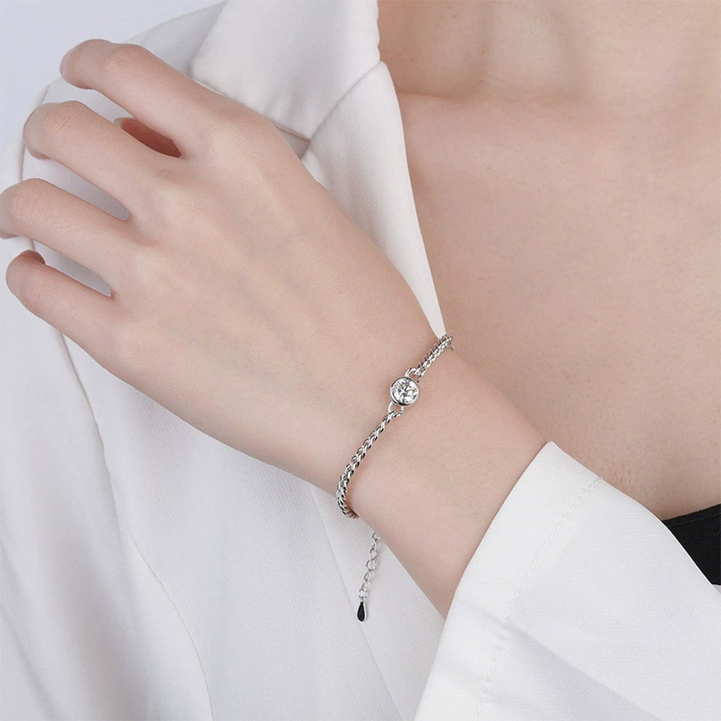 Round Moissanite Beaded Cuban Chain Bracelet in White Gold-Plated S925 sterling silver worn on wrist model view showing scale and adjustable fit