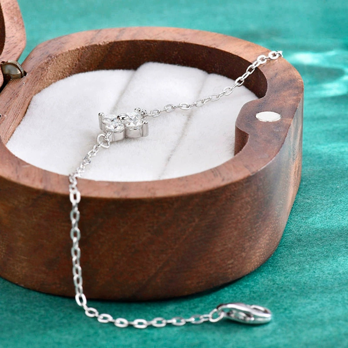Clover Round Moissanite Charm Bracelet in Gold-Plated S925 sterling silver angled product display showing bracelet silhouette