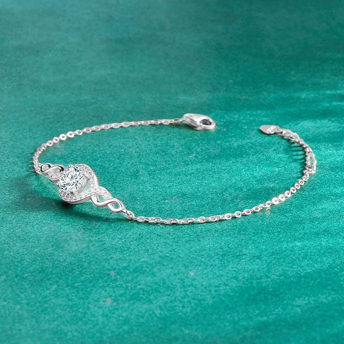 Infinity Halo Round Moissanite Bracelet with CZ in Gold-Plated S925 sterling silver angled product display showing bracelet silhouette
