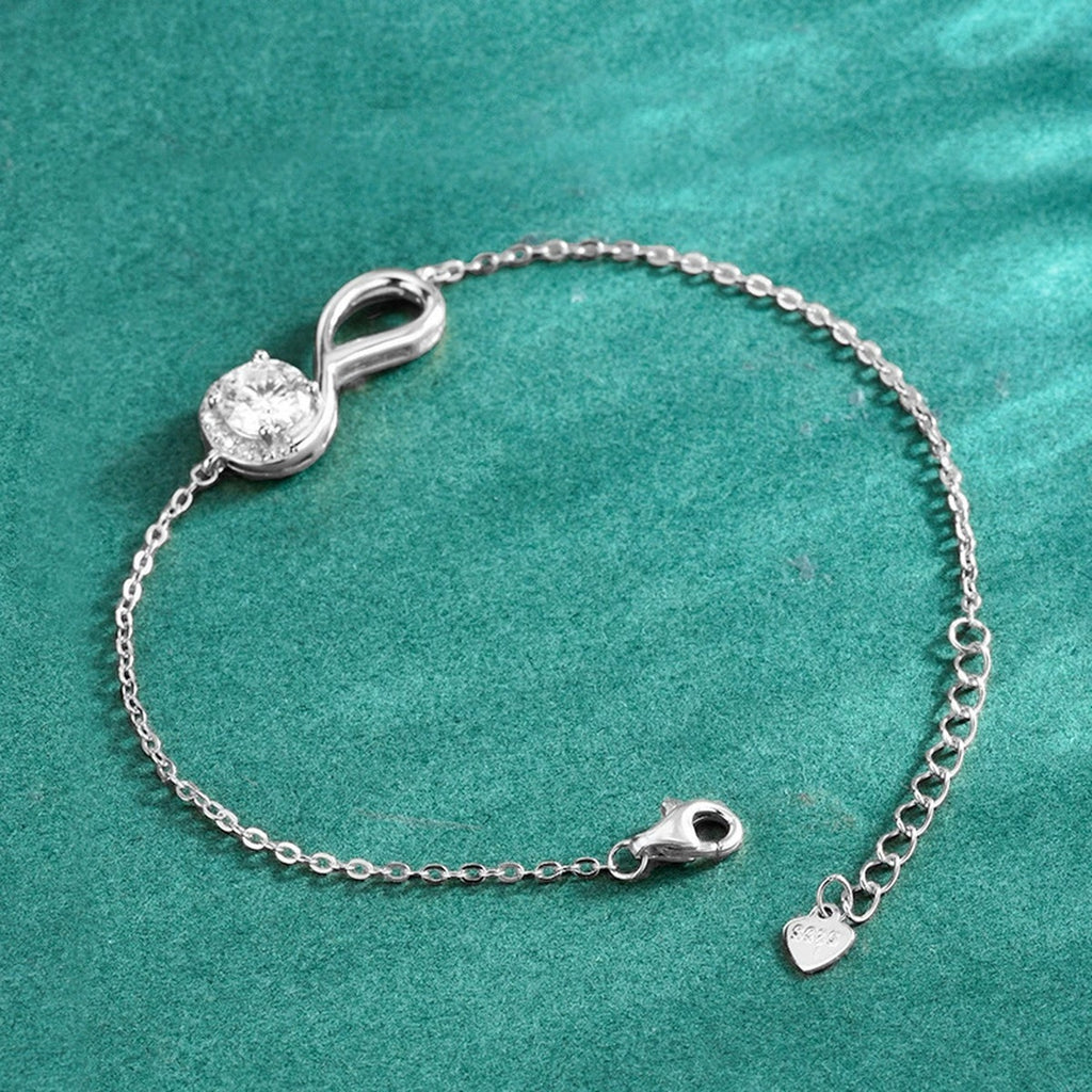 Infinity Round Moissanite Bracelet with CZ in Gold-Plated S925 sterling silver angled product display showing bracelet silhouette