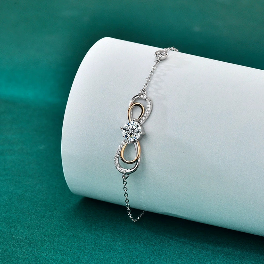 Galaxy Infinity Round Moissanite Bracelet with CZ in White Gold-Plated S925 sterling silver angled product display showing bracelet silhouette