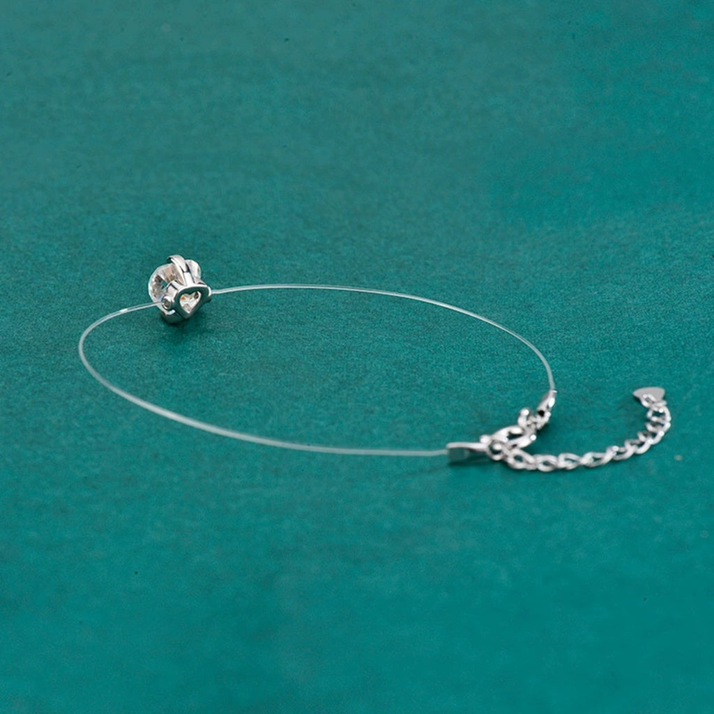 Heart-Cut Moissanite Invisible Chain Bracelet in White Gold-Plated S925 sterling silver close-up bracelet detail view showing clasp and motif