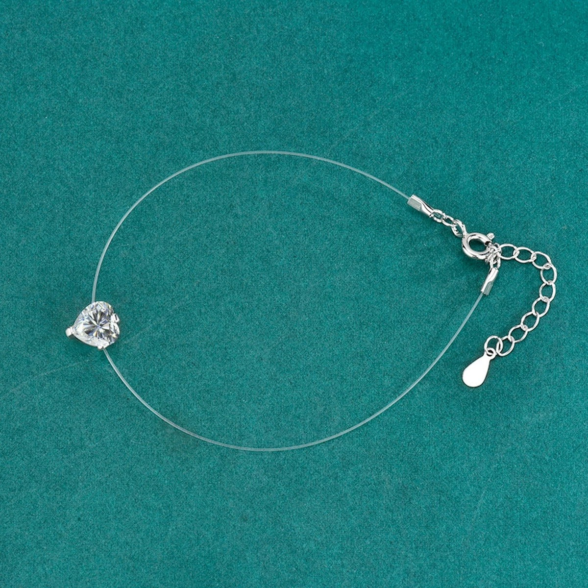 Heart-Cut Moissanite Invisible Chain Bracelet in White Gold-Plated S925 sterling silver angled product display showing bracelet silhouette