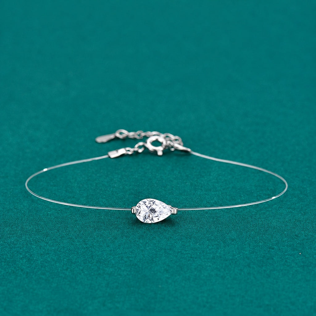 Pear-Cut Moissanite Invisible Chain Bracelet in White Gold-Plated S925 sterling silver styled product scene showing stone sparkle and chain detail