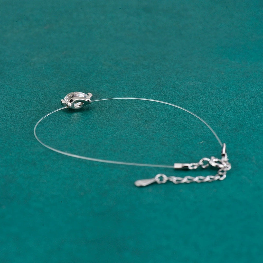 Pear-Cut Moissanite Invisible Chain Bracelet in White Gold-Plated S925 sterling silver close-up bracelet detail view showing clasp and motif