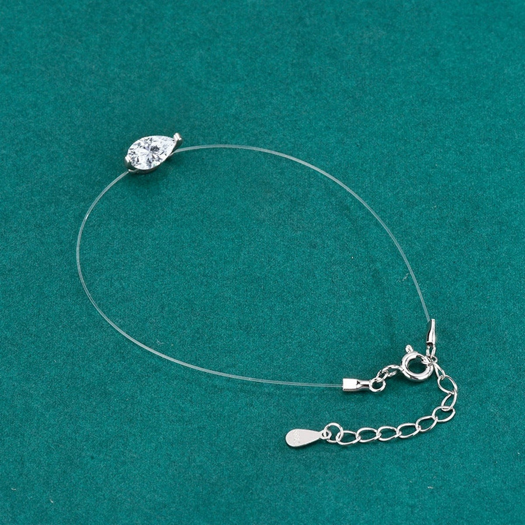 Pear-Cut Moissanite Invisible Chain Bracelet in White Gold-Plated S925 sterling silver angled product display showing bracelet silhouette