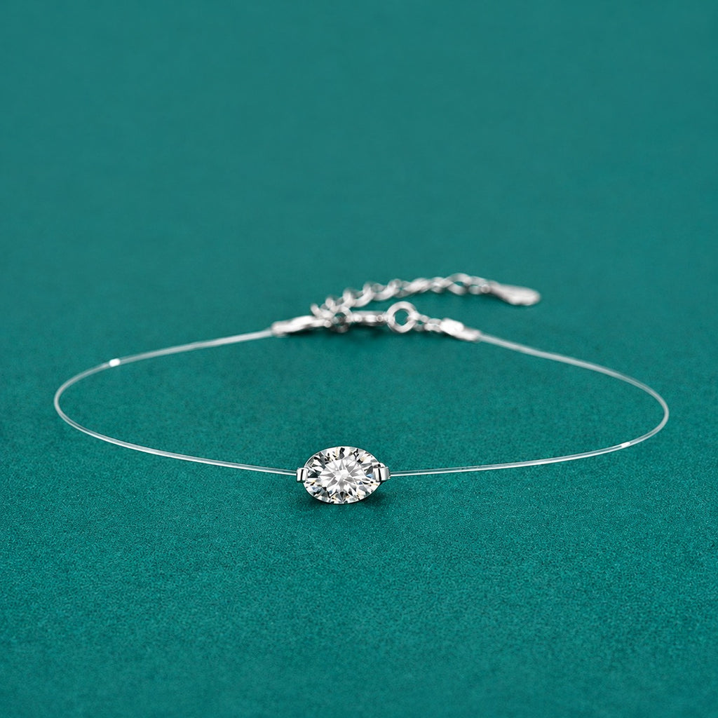 Oval-Cut Moissanite Invisible Chain Bracelet in White Gold-Plated S925 sterling silver styled product scene showing stone sparkle and chain detail
