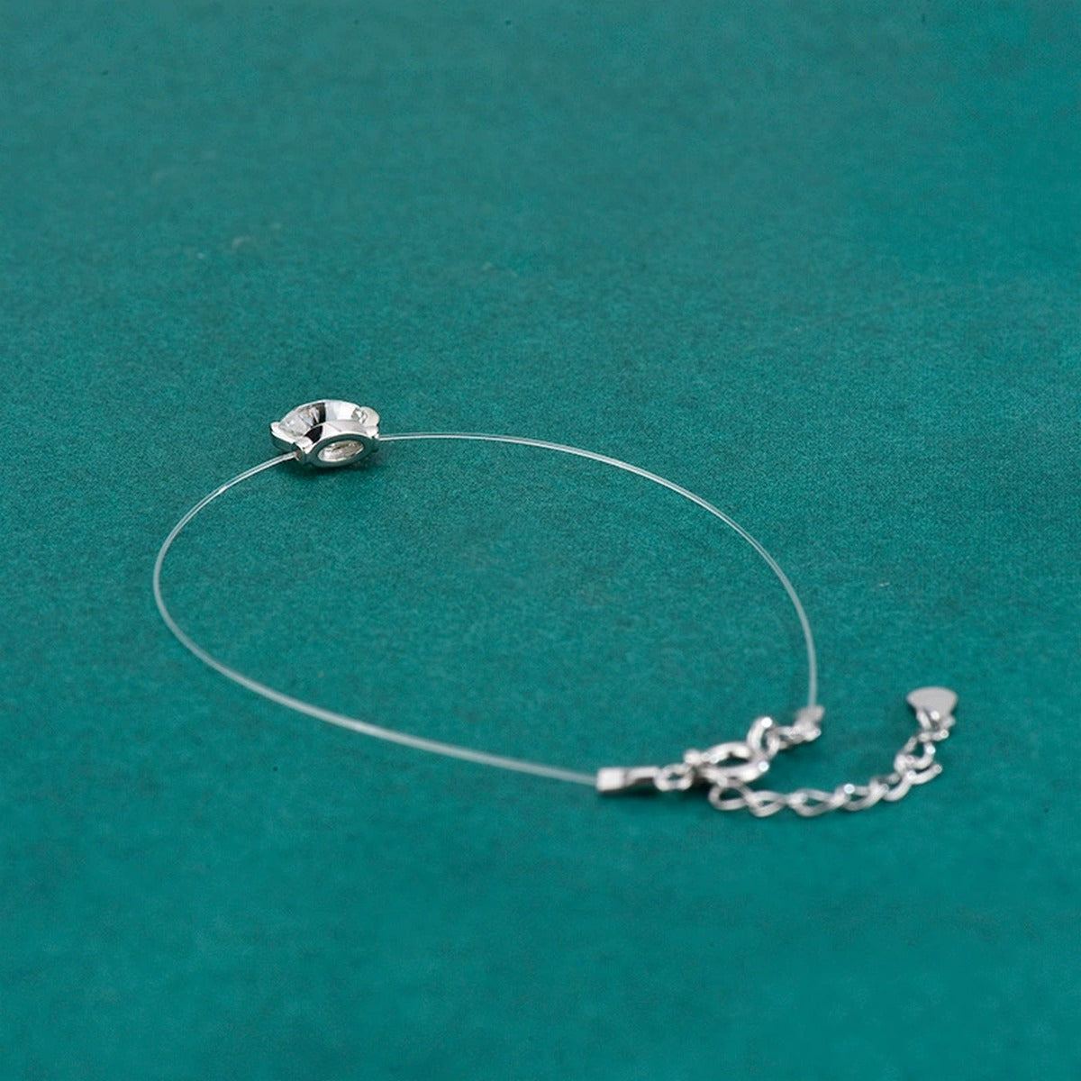 Oval-Cut Moissanite Invisible Chain Bracelet in White Gold-Plated S925 sterling silver additional product photo showing finish and setting