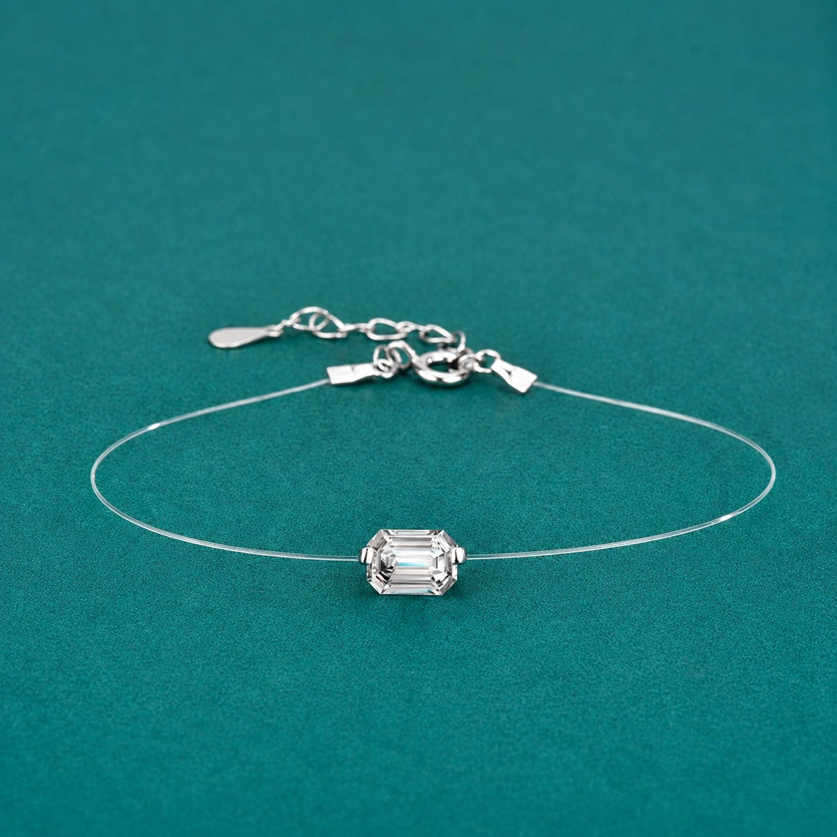 Emerald or Radiant-Cut Moissanite Invisible Chain Bracelet in White Gold-Plated S925 sterling silver close-up bracelet detail view showing clasp and motif
