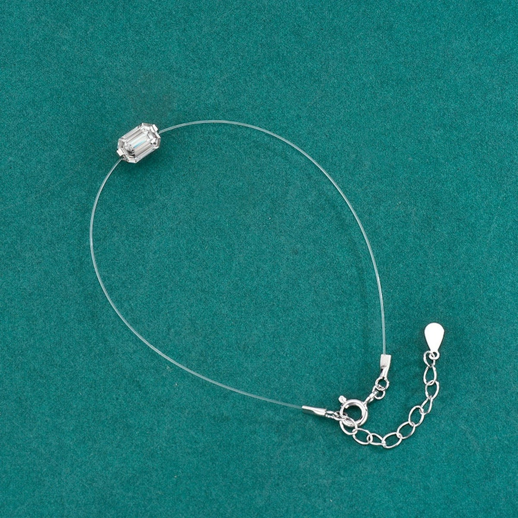 Emerald or Radiant-Cut Moissanite Invisible Chain Bracelet in White Gold-Plated S925 sterling silver angled product display showing bracelet silhouette