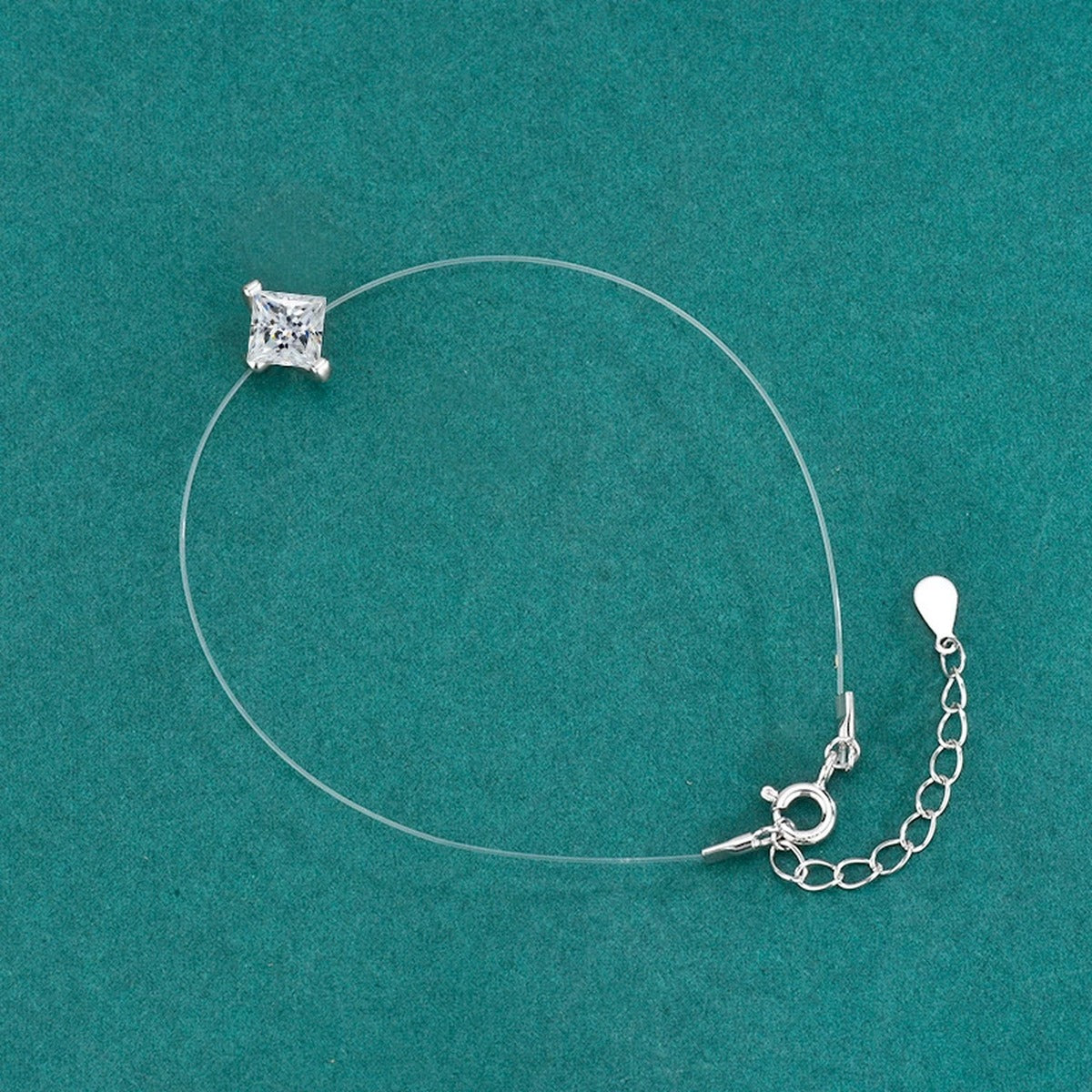 Princess-Cut Moissanite Invisible Chain Bracelet in White Gold-Plated S925 sterling silver close-up bracelet detail view showing clasp and motif