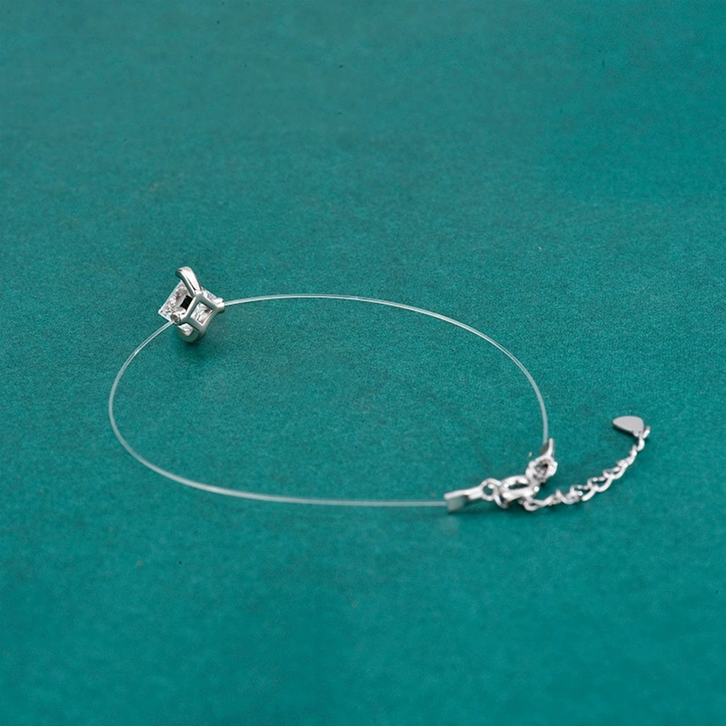 Princess-Cut Moissanite Invisible Chain Bracelet in White Gold-Plated S925 sterling silver angled product display showing bracelet silhouette